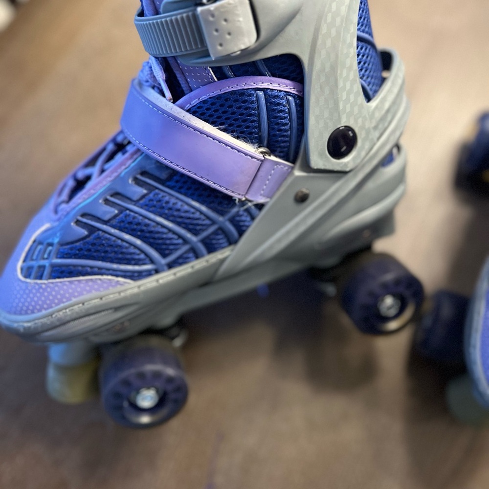 Gray and Blue Roller Skates